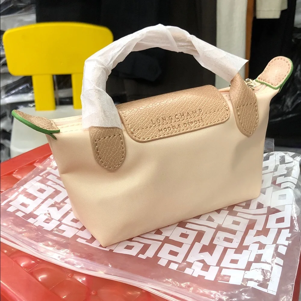 Longchamp Pale Peach Cosmetic Pouch with Tan Flap